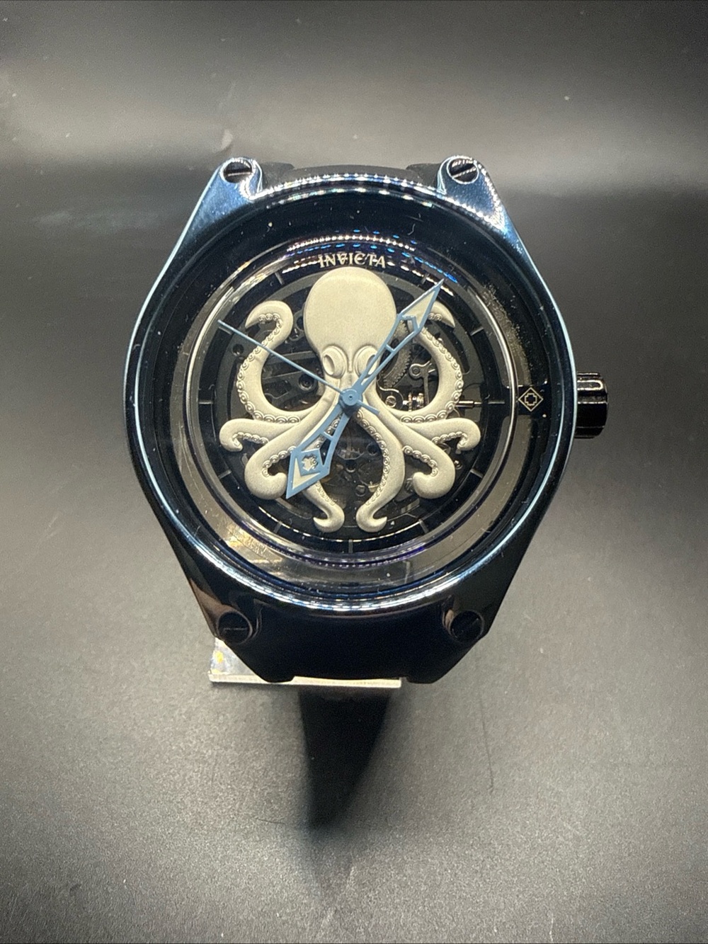 Invicta Black Watch with White Octopus Dial and Blue Hands